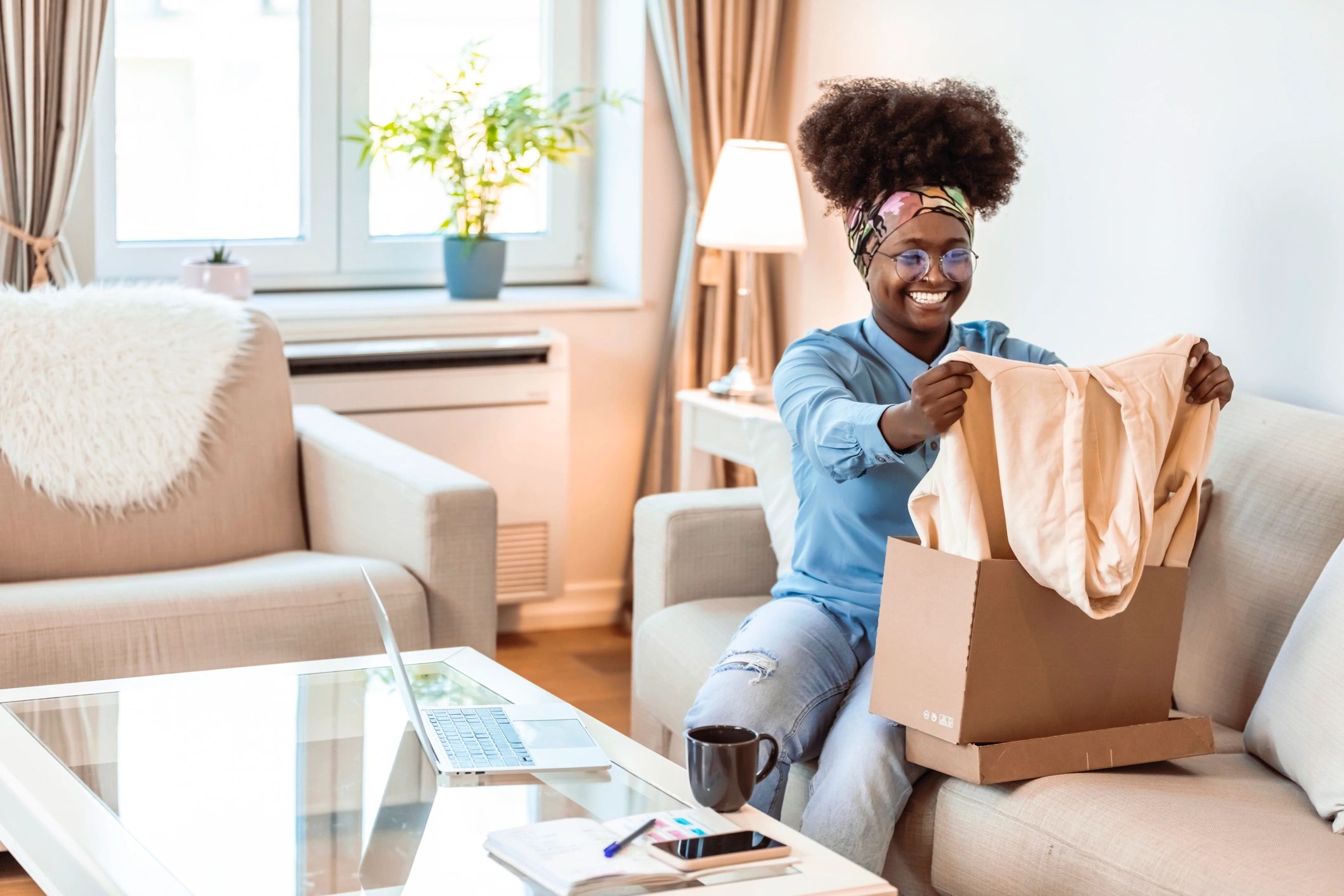 Customer unboxing a delivered package